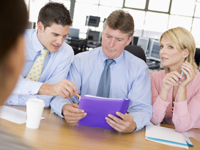 Stock Traders Conducting Interview